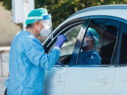 medical-personnel-wearing-ppe-performing-pcr-with-swab-their-hand-patient-inside-his-car-detect-if-he-is-infected-with-covid-19_325364-217