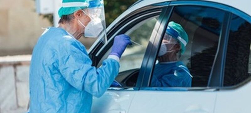 medical-personnel-wearing-ppe-performing-pcr-with-swab-their-hand-patient-inside-his-car-detect-if-he-is-infected-with-covid-19_325364-217