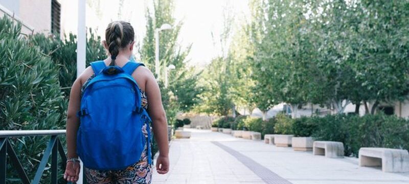 obese-blonde-girl-with-blue-backpack-her-way-school_323169-141