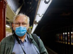 old-man-medical-mask-standing-subway-coronavirus-epidemic-expect-train-subway_73110-8930