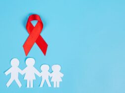 red-knowledge-ribbon-family-cut-paper-hiv-awareness-world-aids-day-world-sexual-health-day_1150-24430