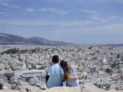 romantic-couple-sightseeing-athens-from-philosophical-mountain_164235-358