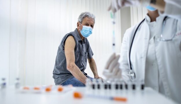 senior-man-about-get-vaccine-shot-clinic-during-corona-virus-pandemic-stay-healthy_308072-647