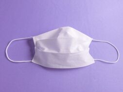 surgical-mask-minimalist-purple-background_58702-687