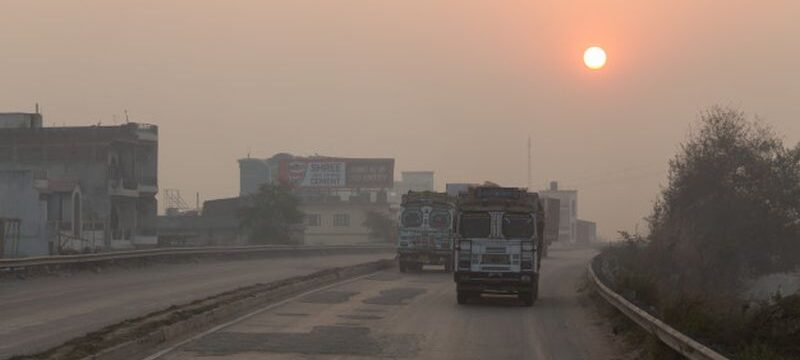 unidentified-people-traffic-india_38810-2329