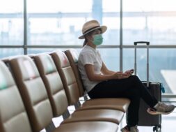 young-female-wearing-face-mask-sitting-chair-airport-protection-coronavirus-disease-covid-19-infection-asian-woman-traveler-new-normal-travel-bubble-social-distancing_42256-2704