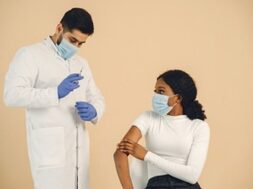 african-american-woman-getting-vaccinated-isolated-coronavirus-concept_1157-48138