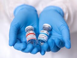 close-up-hands-healthcare-worker-showing-different-types-covid-vaccine_199091-416