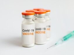 coronavirus-vaccine-close-up-ampoules-syringe_101969-1637