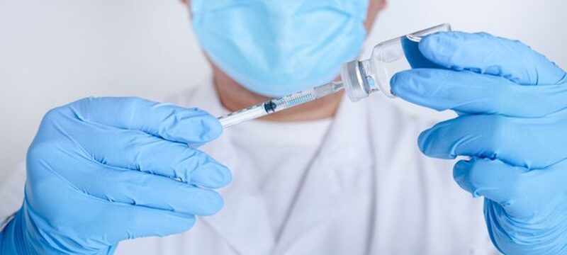 doctors-scientists-hold-syringes-vials-with-covid-19-vaccine-try-injections-treat-patients-hospitals_42128-626