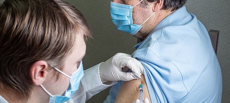 elderly-man-caucasian-appearance-mask-receives-dose-coronavirus-vaccination-home_308589-1588