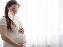 expectant-mother-white-t-shirt-with-protective-mask-against-coronavirus-her-face_169016-11303