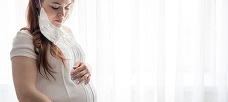 expectant-mother-white-t-shirt-with-protective-mask-against-coronavirus-her-face_169016-11303