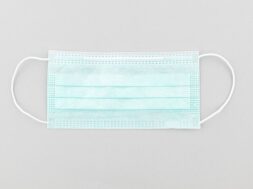 green-disposable-surgical-face-mask_53876-94450