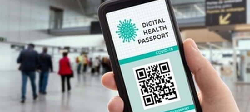 hand-with-smartphone-with-digital-health-vaccination-passport-screen_136875-1977