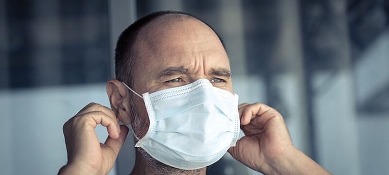 man-wearing-facial-disposable-mask-avoid-viral-infection-virus-protection_390094-37