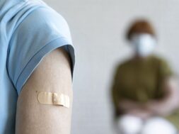 man-with-bandage-arm-after-vaccination_23-2148988233