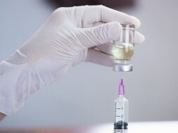 medical-hand-gloves-dispose-medication-needle-syringe-concept-shot-vaccine-vial-dose-hypodermic-injection-treatment_36755-659