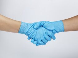 medical-staff-shaking-hands-during-coronavirus-pandemic_53876-95283