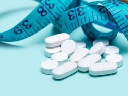 pills-spilling-out-pill-bottle_114963-1052