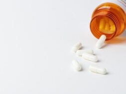 pills-viral-disease-spilled-from-bottle_53876-95033