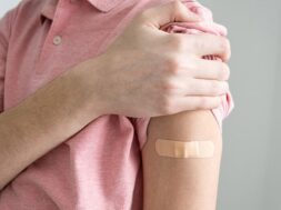 plaster-arm-after-vaccination-against-covid19-infection-vaccination-against-coronavirus_95685-985