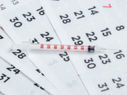 syringe-monthly-calendar-close-up-vaccination_175682-15758