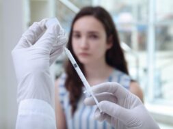 young-girl-receiving-vaccination-hospital_392895-18857