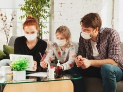 caucasian-famiy-face-masks-gloves-isolated-home-with-coronavirus_155003-40701