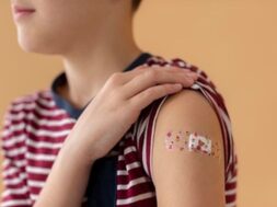 close-up-wearing-band-aid_23-2148989339