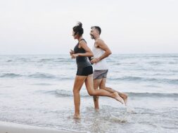 Couple jogging on a beach