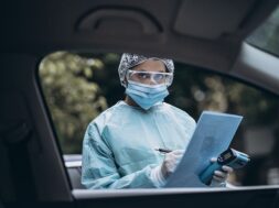 doctor-epidemiologist-fighting-with-coronavirus-covid-19-nurse-wears-protective-suit-mask-during-covid19-outbreak_1153-6297