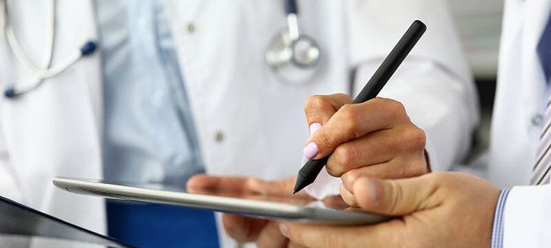 female-doctor-making-electronic-notes-tablet-pc_151013-4382