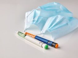 insulin-syringe-pens-medical-masks-white-table-need-protect-people-risk_327813-393 (1)