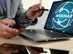 man-with-laptop-showing-webinar-screen_36325-2225