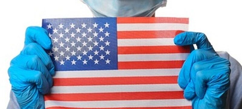 pandemic-covid-19-theme-woman-protective-gloves-medical-face-mask-holds-usa-flag-isolated-white_175682-16143