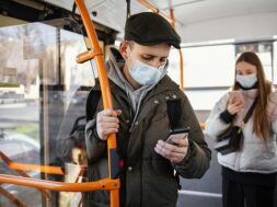 people-public-transportation-wearing-mask_23-2148863821
