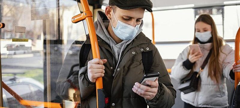 people-public-transportation-wearing-mask_23-2148863821