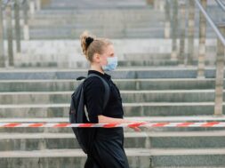 schoolgirl-protective-medical-mask-sunset-modern-pupil-with-backpack-during-covid-19-quarantine_229518-5146