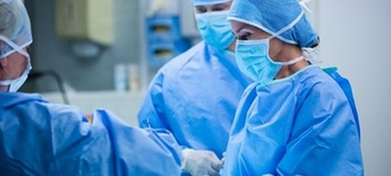 surgeons-performing-operation-operation-room_1170-2233
