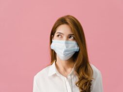 Young Asia girl wearing medical face mask with dressed in casual