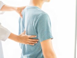 Close up of Physiotherapist working with patient in clinic