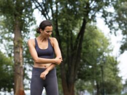 medium-shot-woman-experiencing-elbow-pain