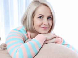 Attractive middle aged woman looking in camera relaxing at home. The beautiful face close up.