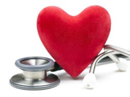 Close up of red heart and silver stethoscope