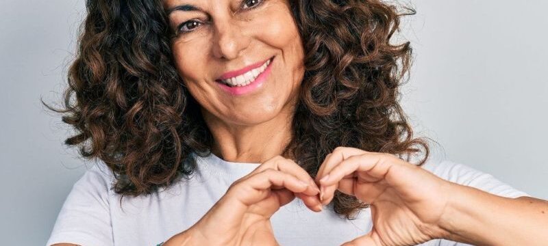 9d9148b6-bigstock-Middle-age-hispanic-woman-wear-432374045