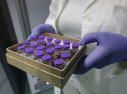 Health workers prepare doses of the Pfizer-BioNTech COVID-19 vaccine at a coronavirus disease (COVID-19) vaccination center in Naples, southern Italy.