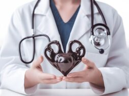 doctor-holding-heart-shaped-object-his-hands