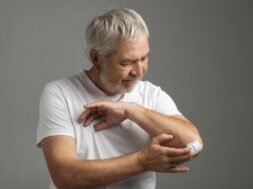 medium-shot-man-using-cream