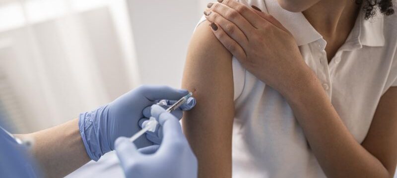 doctor-vaccinating-patient-clinic (2)